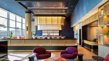 Main sitting area and bar at the Etihad Lounge at Dulles Airport